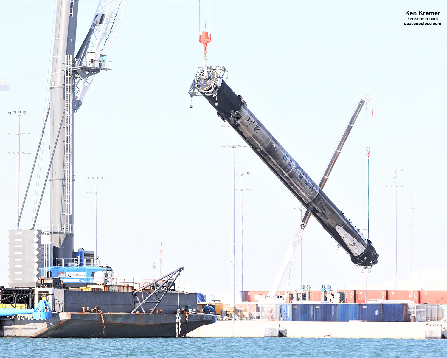 Legless Quadruply Launched SpaceX Falcon 9 Lowered Horizontal After Landing Legs Detached, Shipped Back to Cape: Photos