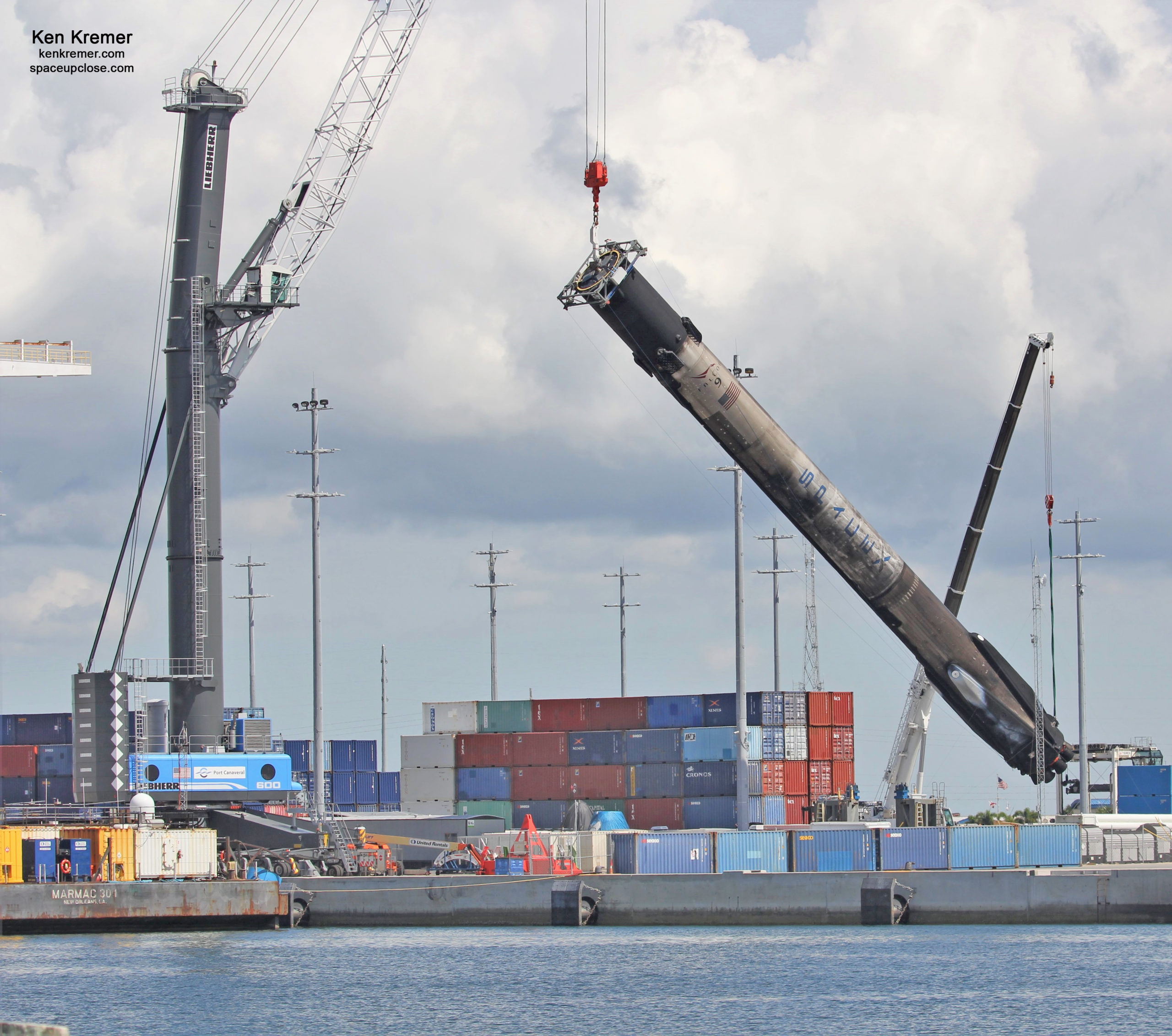 5x Flown Falcon 9 Booster Tilted Horizontal after All Legs Retracted for Transport Back to Cape: Photos