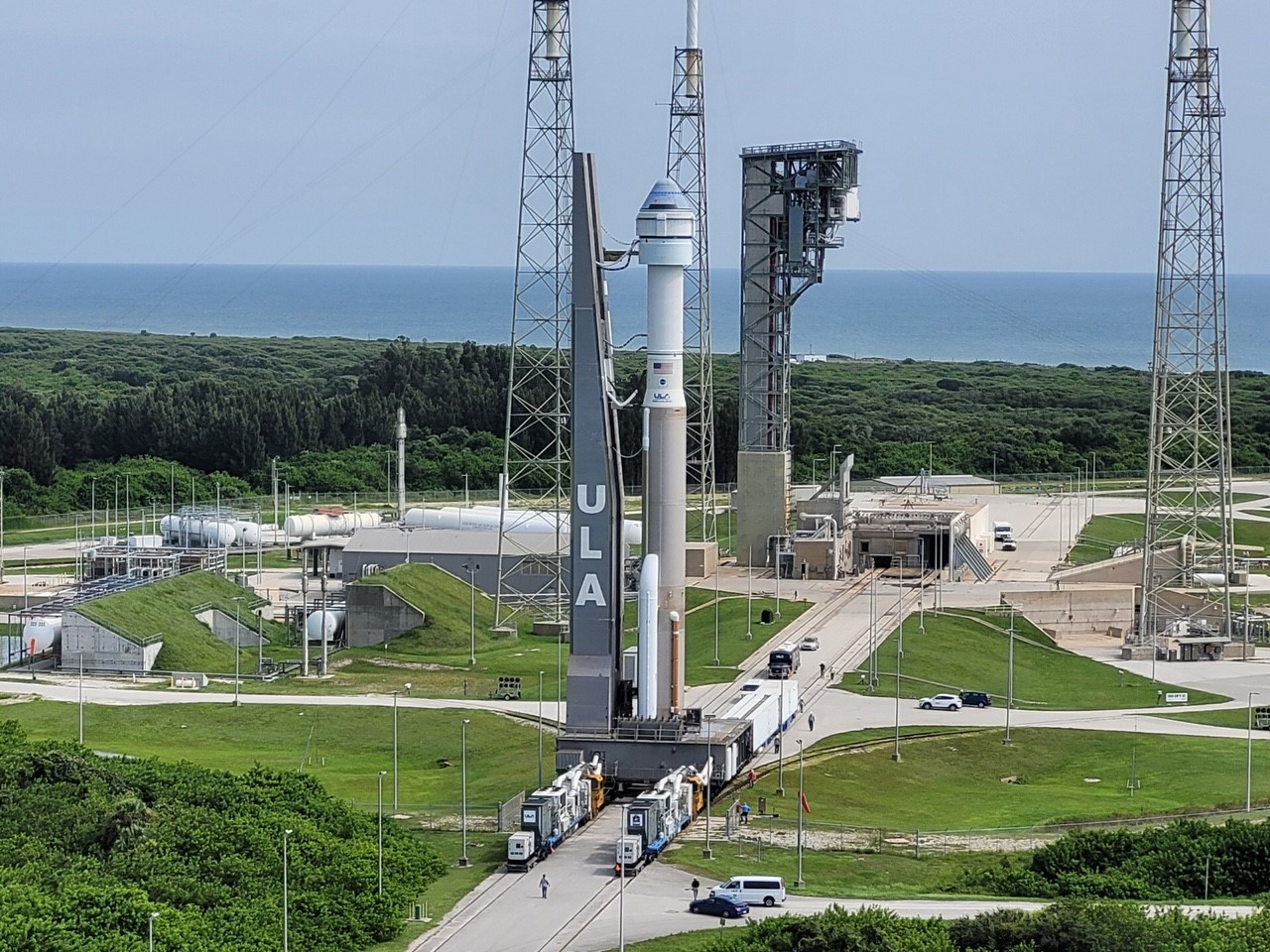 Boeing Starliner Rolls Back to Vertical Integration Facility as Propulsion Valve Problems Force Further Delays