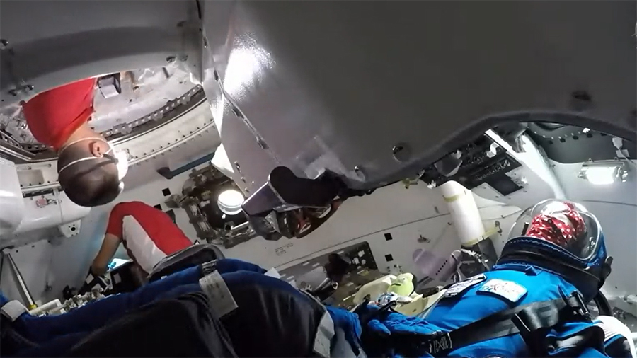 Station Astronauts Open Hatch and Enter Boeing Starliner on Uncrewed Test Flight for NASA